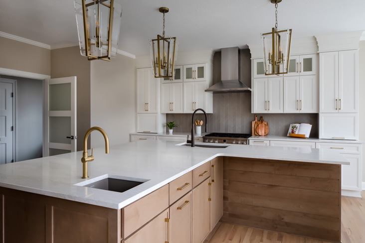 Neutral wood tones complement this kitchen design